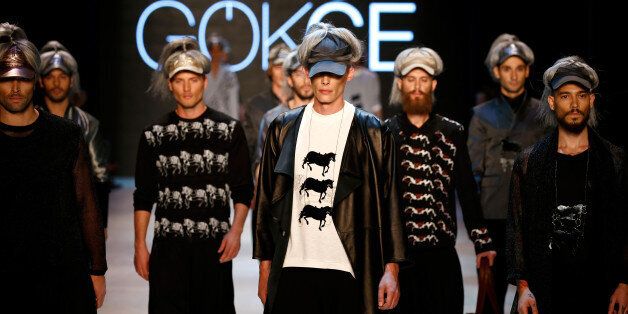ISTANBUL, TURKEY - OCTOBER 13: Models walk the runway at the Hatice Gokce show during Mercedes Benz Fashion Week Istanbul SS15 at Antrepo 3 on October 13, 2014 in Istanbul, Turkey. (Photo by Andreas Rentz/Getty Images for IMG)