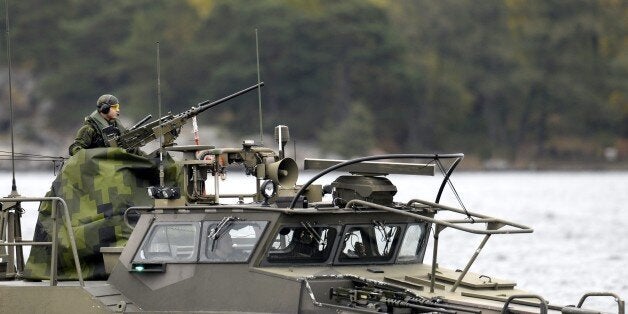 A Swedish Navy fast-attack craft patrols in the the Stockholm Archipelago, Sweden, on October 18 2014. The Swedish armed forces announced a large military operation around islands off Stockholm late Friday following reports of suspicious 'foreign underwater activity'. AFP PHOTO / TT NEWS AGENCY / PONTUS LUNDAHL / SWEDEN OUT (Photo credit should read PONTUS LUNDAHL/AFP/Getty Images)