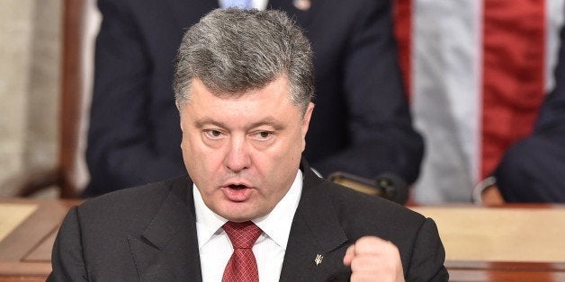 Ukrainian President Petro Poroshenko addresses a joint session of the US Congress at the Capitol in Washington on September 18, 2014. AFP PHOTO/Nicholas KAMM (Photo credit should read NICHOLAS KAMM/AFP/Getty Images)