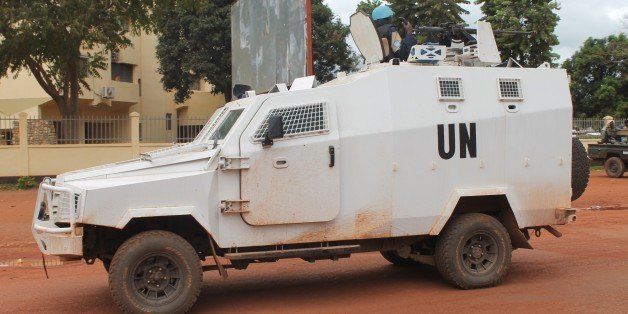 An armoured vehicle of the UN peacekeeping mission in Central African Republic patrols in downtown Bangui on October 11, 2014. The UN Security Council on October 10 called for an end to the violence engulfing the Central African Republic's capital and condemned the killing of a Pakistani peacekeeper near Bangui. After months of relative calm, Bangui was once again swept up in sectarian fighting that continued for a third straight day on october 10. AFP PHOTO / STR (Photo credit should read STR/AFP/Getty Images)