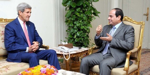 CAIRO, EGYPT - SEPTEMBER 13: US Secretary of State John Kerry (L) meets with Egyptian President Abdel Fattah al-Sisi (R) at the presidential palace in Cairo, Egypt, on September 13, 2014. (Photo by Egyptian Presidency Press Office/Pool/Anadolu Agency/Getty Images)