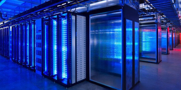 This undated photo provided by Facebook shows the server room at the company's data center in Prineville, Ore. The revelations that the National Security Agency is perusing millions of U.S. customer phone records at Verizon and snooping on the digital communications stored by nine major Internet services illustrate how aggressively personal data is being collected and analyzed. (AP Photo/Facebook, Alan Brandt)