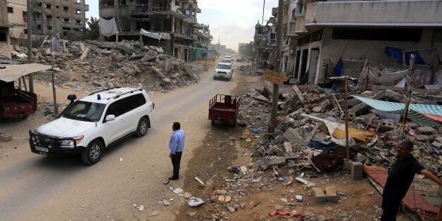 GAZA CITY, GAZA - OCTOBER 14: A convoy of UN armored cars as United Nations Secretary-General Ban Ki-moon visits the schools run by the United Nations Relief and Works Agency for Palestine Refugees in the Near East (UNRWA) in Gaza city on October 14, 2014. U.N. chief Ban Ki-moon arrived Tuesday in the Gaza Strip on a few hours' visit to the embattled Palestinian enclave which witnessed a devastating Israeli onslaught recently. (Photo by Mohammed Asad/Anadolu Agency/Getty Images)