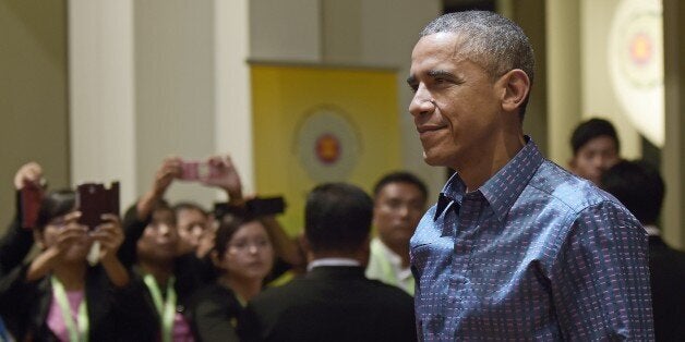 US President Barack Obama arrives at the Myanmar International Convention Center in Myanmar's capital Naypyidaw on November 12, 2014. US President Barack Obama landed in Myanmar on November 12 as the once cloistered nation hosted its biggest gathering of world leaders since shedding junta rule, but concerns over the pace of democratic reforms surfaced immediately. AFP PHOTO / Christophe ARCHAMBAULT (Photo credit should read CHRISTOPHE ARCHAMBAULT/AFP/Getty Images)