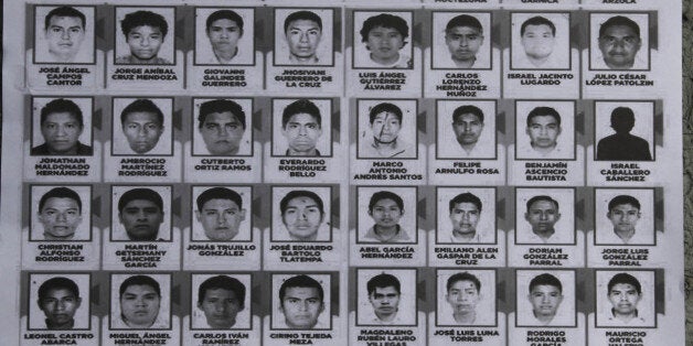 A poster seen at a demonstration at the Angel of Independence, shows images of the 43 disappeared rural college students, in Mexico City, Saturday, Nov. 8, 2014. Suspects in the disappearance of the 43 college students from the southern state of Guerrero, have confessed to loading the youths onto dump trucks, murdering them at a landfill, then burning the bodies and dumping the ashen remains into a river, Mexican authorities said Friday. (AP Photo/Marco Ugarte)(AP Photo/Marco Ugarte)