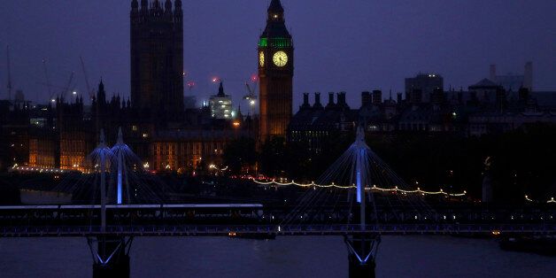 A view of central London's skyline by the river Thames, Monday, Nov. 11, 2013. Hungerford Bridge, foreground, Big Ben's clock tower and Houses of Parliament, behind. (AP Photo/Lefteris Pitarakis)