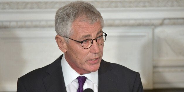 US Defense Secretary Chuck Hagel speaks during a press conference where President Barack Obama announced Hagel's departure at the White House on November 24, 2014 in Washington, DC. Hagel will remain at his post until a successor is named and confirmed by the Senate. AFP PHOTO/Mandel NGAN (Photo credit should read MANDEL NGAN/AFP/Getty Images)