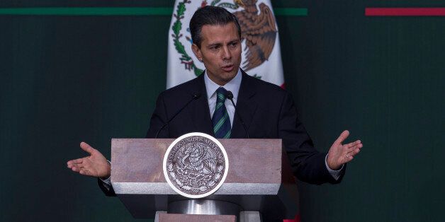 MEXICO CITY, MEXICO - NOVEMBER 27: Enrique PeÃ±Âa Nieto President of Mexico gives a speech to announce new security strategy plans at Palacio Nacional on November 27, 2014 in Mexico City, Mexico. (Photo by Miguel Tovar/LatinContent/Getty Images)