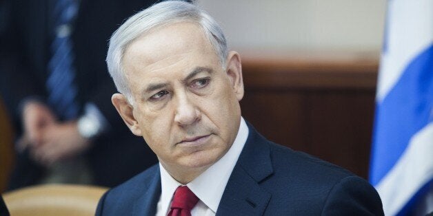 Israeli Prime Minister Benjamin Netanyahu attends the weekly cabinet meeting in his Jerusalem office on November 9, 2014. AFP PHOTO/POOL/DAN BALILTY (Photo credit should read DAN BALILTY/AFP/Getty Images)