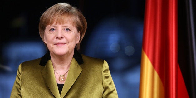 BERLIN, GERMANY - DECEMBER 30: (EMBARGOED FOR ALL PUBLICATIONS UNTIL DECEMBER 31, 2013 AT 00:01 CET) German Chancellor Angela Merkel poses moments after giving her New Year's television address to the nation at the federal chancellery (Bundeskanzleramt) on December 30, 2013 in Berlin, Germany. Merkel spoke of the challenges and priorities set for the German government for 2014. (Photo by Adam Berry/Getty Images)