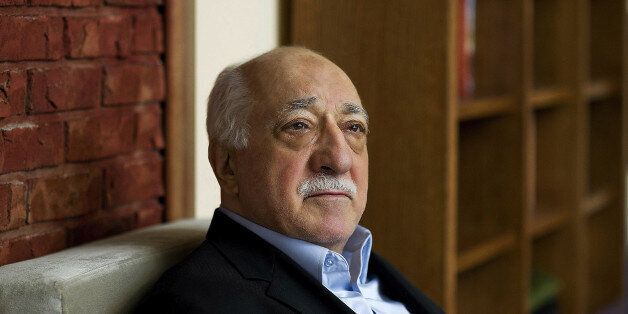 FILE - In this March 15, 2014 file photo, Turkish Islamic preacher Fethullah Gulen is pictured at his residence in Saylorsburg, Pennsylvania, United States. Police conducted raids in a dozen Turkish cities Sunday, detaining at least 24 people â including journalists, TV producers and police â known to be close to a movement led by a U.S.-based moderate Islamic cleric who is a strong critic of President Recep Tayyip Erdogan. It was the latest crackdown on cleric Fethullah Gulen's movement, which the government has accused of orchestrating an alleged plot to try to bring it down. (AP Photo/Selahattin Sevi, File)