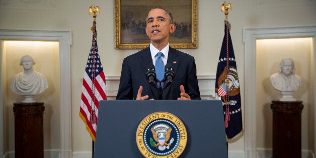 WASHINGTON, DC - DECEMBER 17: U.S. President Barack Obama speaks to the nation about normalizing diplomatic relations the Cuba in the Cabinet Room of the White House on December 17, 2014 in Washington, DC. Obama announced plans to restore diplomatic relations with Cuba, over 50 years after they were severed in January 1961. In a prisoner exchange, U.S. contractor Alan Gross was freed after being held in Cuba since 2009 and sent to Cuba three Cuban spies who had imprisoned in the U.S. since 2001. (Photo by Doug Mills-Pool/Getty Images)