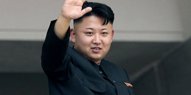 FILE - In this July 27, 2013, file photo, North Korean leader Kim Jong Un waves to spectators and participants of a mass military parade celebrating the 60th anniversary of the Korean War armistice in Pyongyang, North Korea. To say that Kim Jong Un is the leader of his country is a gross understatement. In North Korea, he is regarded as the epitome of his country. (AP Photo/Wong Maye-E, File)