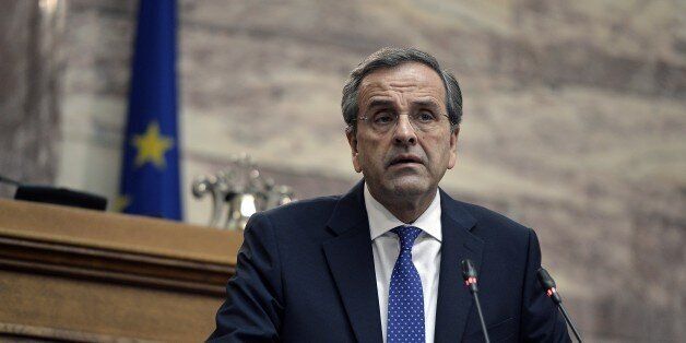 Greek Prime Minister Antonis Samaras addresses his party's parliamentary group at the Greek parliament in Athens, on December 11, 2014. Anxiety over Greece's immediate political future has risen after the government unexpectedly brought forward a high-stakes presidential vote. AFP PHOTO/ LOUISA GOULIAMAKI (Photo credit should read LOUISA GOULIAMAKI/AFP/Getty Images)