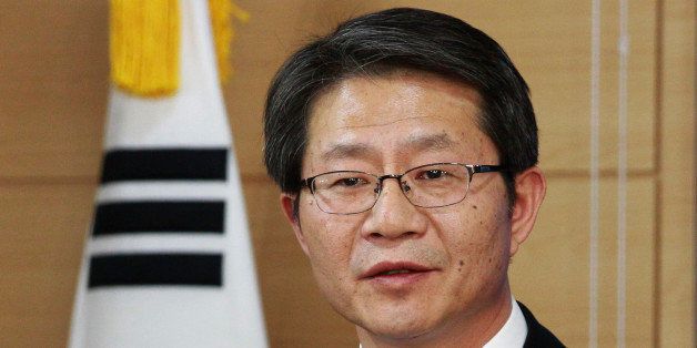 South Korean Unification Minister Ryoo Kihl-jae speaks during a press conference at the government complex in Seoul, South Korea, Thursday, Feb. 6, 2014. While North Korea is threatening to cancel a reunion of Korean War-divided families later this month only one day after agreeing on dates for the emotional meetings, Ryoo said that the agreement must be followed. (AP Photo/Ahn Young-joon)