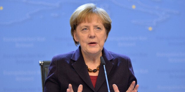 BRUSSELS, BELGIUM - DECEMBER 18: German Chancellor Angela Merkel delivers a speech during a press conference held after European Union summit at the EU headquarters in Brussels, Belgium on December 18, 2014. (Photo by Dursun Aydemir/Anadolu Agency/Getty Images)