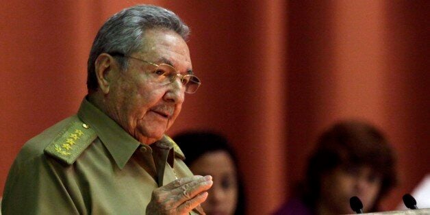 Cuba's President Raul Castro delivers his speech at the closing of the second day of a twice-annual legislative sessions, at the National Assembly in Havana, Cuba, Saturday, Dec. 21, 2013. Castro issued a stern warning to entrepreneurs pushing the boundaries of Cubaâs economic reform, saying âthose pressuring us to move faster are moving us toward failure.â(AP Photo/Cubadebate, Ismael Francisco))