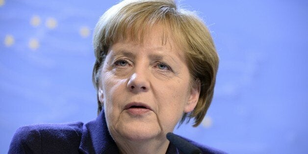 Federal Chancellor of Germany Angela Merkel talks to the media at the end of an European Union Summit held at the EU Council building in Brussels, December 18, 2014. AFP Photo/Thierry Charlier (Photo credit should read THIERRY CHARLIER/AFP/Getty Images)