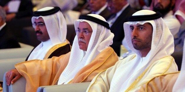 Qatar Oil Minister Mohammed bin Saleh Al-Sada (L), Saudi Oil Minister Ali al-Naimi, and United Arab Emirates Energy Minister Suhail bin Mohamed al-Mazroui (R) attend the opening session of the 10th Arab Energy Conference in Abu Dhabi, on December 21, 2014. 'Irresponsible' levels of output by producers from outside the OPEC oil cartel is among the main causes of the slump in prices, the United Arab Emirates energy minister told the energy forum. AFP PHOTO/MARWAN NAAMANI (Photo credit should read MARWAN NAAMANI/AFP/Getty Images)