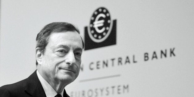 FRANKFURT AM MAIN, GERMANY - DECEMBER 04: (EDITORS NOTE: This image was processed using digital filters.) Mario Draghi, President of the European Central Bank pictured during his first press conference following the monthly ECB board meeting in the new ECB headquaters on December 4, 2014 in Frankfurt am Main, Germany. (Photo by Thomas Lohnes/Getty Images)