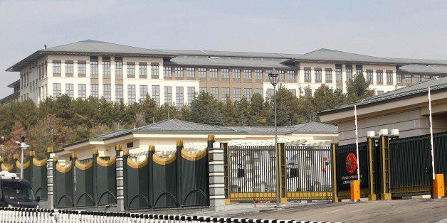 A picture shows the new Ak Saray presidential palace (White Palace) on the outskirts of Ankara on October 29, 2014. Turkish President Recep Tayyip Erdogan unveiled his new presidential palace on the outskirts of Ankara, denounced by ecologists as an environmental blight and by the opposition as new evidence of his autocratic tendencies. An immense project built at a reported cost of $350 million, it has an area of 200,000 square metres, 1,000 rooms and architecture that is supposed to marry modernism and the traditions of the mediaeval Seljuk dynasty. AFP PHOTO/ADEM ALTAN (Photo credit should read ADEM ALTAN/AFP/Getty Images)