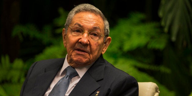 Cuba's President Raul Castro, talks with Prime Minister Freundel Stuart, of Barbados, not seen, at Revolution Palace in Havana, Cuba, Sunday, Dec. 7, 2014. (AP Photo/Ramon Espinosa, Pool)