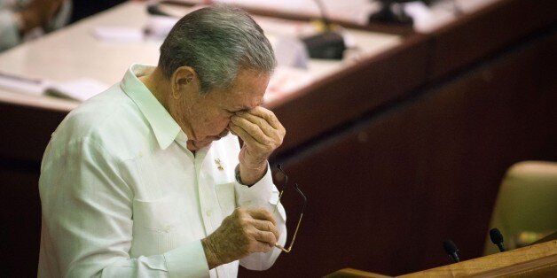 Cuban President Raul Castro gestures at the end of the Parliament Annual Session, on December 20, 2014 in Havana. AFP PHOTO/ADALBERTO ROQUE (Photo credit should read ADALBERTO ROQUE/AFP/Getty Images)