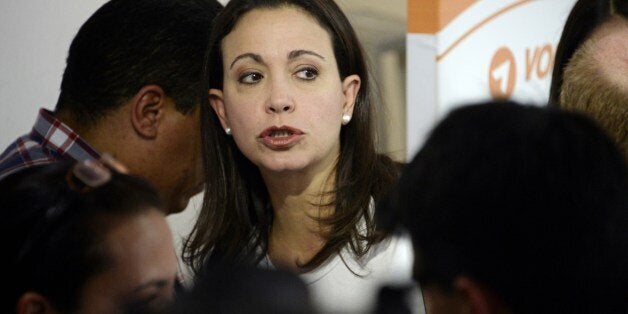 Opposition Leader Maria Corina Machado attends to the press conference in support of the arrested opposition leader Leopoldo