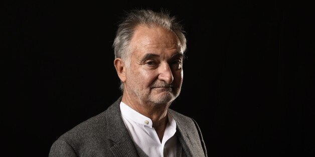 French economist and writer Jacques Attali poses in Paris on November 9, 2014 at the Cite de la Reussite, where political, ec