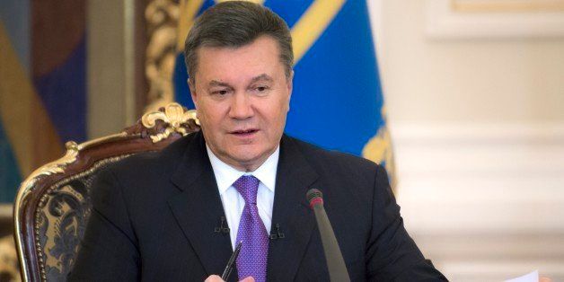 FILE - In this Thursday, Dec. 19, 2013 file photo Ukrainian President Viktor Yanukovych speaks during a press conference in Kiev, Ukraine. Ukraine's embattled president Viktor Yanukovych is taking sick leave on Thursday, Jan. 30, 2014, as the country's political crisis continues without signs of resolution. A statement on the presidential website Thursday said Yanukovych has an acute respiratory illness and high fever. There was no indication of how long he might be on leave or whether he would be able to do any work. (AP Photo/Mykhailo Markiv, Pool)