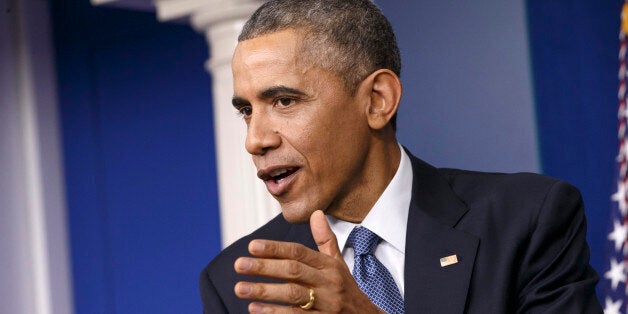 FILE - In this Dec. 19, 2014 file photo, President Barack Obama speaks during a news conference in the Brady Press Briefing Room of the White House in Washington. Frequently criticized as cautious on foreign policy, President Barack Obamaâs secret negotiations to overhaul U.S. policy toward Cuba suggest he is willing to make bold and risky moves, if he can keep tight control of the mission and rely on a handful of close aides to carry it out. (AP Photo/J. Scott Applewhite, File)