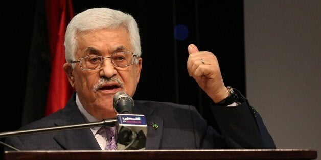 Palestinian President Mahmud Abbas gives a speech in the West Bank city of Ramallah on January 4, 2015. Abbas spoke about the steps he took to try and get membership for Palestinians to the International Criminal Court, in a move strongly condemned by both Washington and Israel. AFP PHOTO/ ABBAS MOMANI (Photo credit should read ABBAS MOMANI/AFP/Getty Images)