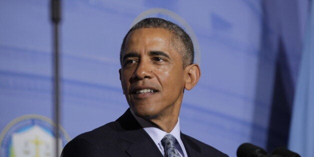 WASHINGTON, DC - JANUARY 12: (AFP OUT) U.S. President Barack Obama delivers a speech at the Federal Trade Commissions office