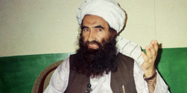 FILE- In this Aug. 22, 1998 file photo, Jalaluddin Haqqani, founder of the militant group the Haqqani network, speaks during an interview in Miram Shah, Pakistan. The U.S. fired scores of missiles into its Pakistani safe haven over the last two years and made stopping its operations a top priority. Yet the Haqqani militant network has thrived and is now considered the No. 1 threat to American troops in Afghanistan. (AP Photo/Mohammed Riaz, File)