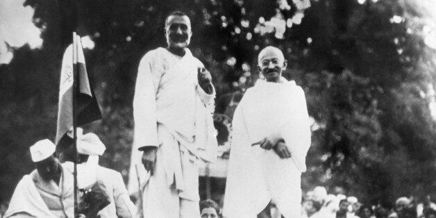 Indian spiritual leader Mohandas Karamchand Gandhi (R), known as the Mahatma Gandhi (1869-1948), poses with Pashtun political and spiritual leader Khan Abdul Ghaffar Khan, 17 May 1938 in Peshawar, during a political meeting. The two men were known for their non-violent opposition to British Rule during the final years of the Imperial rule in the Indian sub-continent. Khan Abdul Ghaffar Khan was known as Badshah Khan or Frontier Gandhi. (Photo credit should read OFF/AFP/Getty Images)