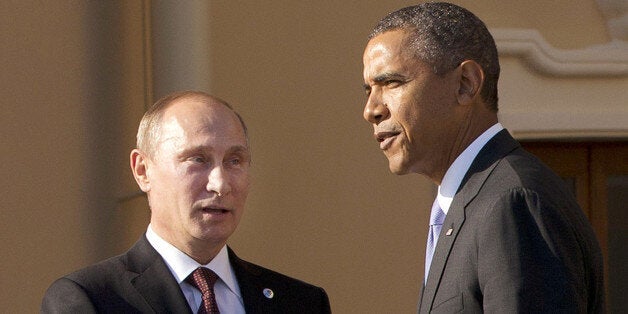 FILE - In this Sept. 5, 2013 file photo, President Barack Obama shakes hands with Russian President Vladimir Putin during arrivals for the G-20 summit at the Konstantin Palace in St. Petersburg, Russia, Thursday, Sept. 5, 2013. Congress is stepping up pressure on the White House to confront Russia over allegations that it is cheating on a key nuclear arms treaty, a faceoff that could further strain U.S.-Moscow relations and dampen President Barack Obama's hopes to add deeper cuts in nuclear arsenals to his legacy. (AP Photo/Pablo Martinez Monsivais)