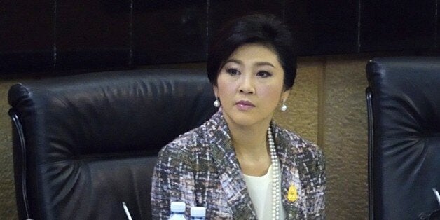 Ousted Thai prime minister Yingluck Shinawatra looks on as she faces impeachment proceedings by the military-stacked National