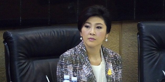 Ousted Thai prime minister Yingluck Shinawatra looks on as she faces impeachment proceedings by the military-stacked National Legislative Assembly (NLA) at the parliament in Bangkok on January 22, 2015. Shinawatra arrived at Thailand's junta-picked legislature on January 22 to make a last ditch defence ahead of an impeachment vote that could see her banned from politics for five years. AFP PHOTO / PORNCHAI KITTIWONGSAKUL (Photo credit should read PORNCHAI KITTIWONGSAKUL/AFP/Getty Images)