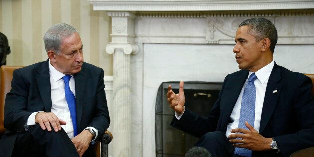 File - In this Sept. 30, 2013, file photo, President Barack Obama meets with Israeli Prime Minister Benjamin Netanyahu in the Oval Office at the White House in Washington. The U.S. and Iran secretly engaged in high-level, face-to-face talks, at least three times over the past year, in a high stakes diplomatic gamble by the administration that paved the way for the historic deal aimed at slowing Iran's nuclear program. After the Sept. 27, phone call between Obama and Iranian president Hassan Rouhani, the U.S. began informing allies about the talks. Obama handled the most sensitive conversation himself, briefing Netanyahu during his Sept. 30 visit to the White House. Israel remains furious about the agreement. (AP Photo/Charles Dharapak)