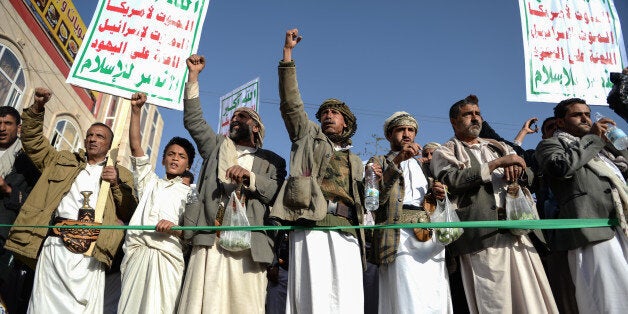 SANA'A, YEMEN - JANUARY 23: Thousands of Yemeni Shiite Houthi followers take part in a protest in Sana'a, Yemen on January 23, 2015 against cartoons by a French magazine Charlie Hebdo mocking Islam's prophet Mohammad. (Photo by Onur Coban/Anadolu Agency/Getty Images)