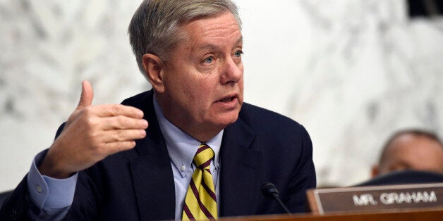 Sen. Lindsey Graham, R-S.C., questions Attorney General nominee Loretta Lynch on Capitol Hill in Washington, Wednesday, Jan. 28, 2015, during the Senate Judiciary Committeeâs hearing on Lynch's nomination. If confirmed, Lynch would replace Attorney General Eric Holder, who announced his resignation in September after leading the Justice Department for six years. The 55-year-old federal prosecutor would be the nationâs first black female attorney general. (AP Photo/Susan Walsh)