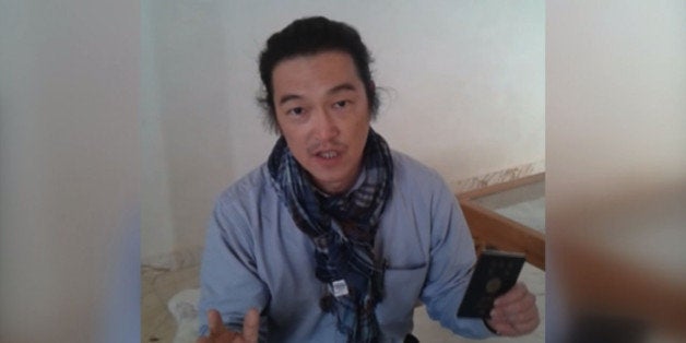 ALEPPO, SYRIA - JANUARY 29 : A frame grab taken from a footage on October 24, 2014, shows Japanese journalist Kenji Goto Jog
