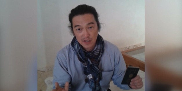 ALEPPO, SYRIA - JANUARY 29 : A frame grab taken from a footage on October 24, 2014, shows Japanese journalist Kenji Goto Jogo, one of two Japanese hostages captured by Islamic State of Iraq and Levant (ISIL), gives an interview in northern Mari district of Aleppo, Syria. (Photo by Huseyin Nasir / Anadolu Agency /Getty Images)