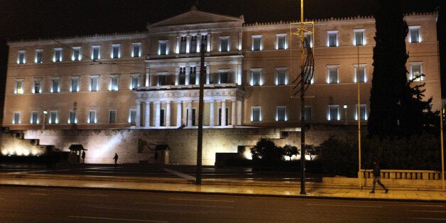 ATHENS, GREECE - JANUARY 28: New Greek government of anti-austerity Syriza party removes the barricades which were set up against the ten thousands of people protesting the government's austerity policy, in Athens, Greece on January 28, 2015. (Photo by Ayhan Mehmet/Anadolu Agency/Getty Images)