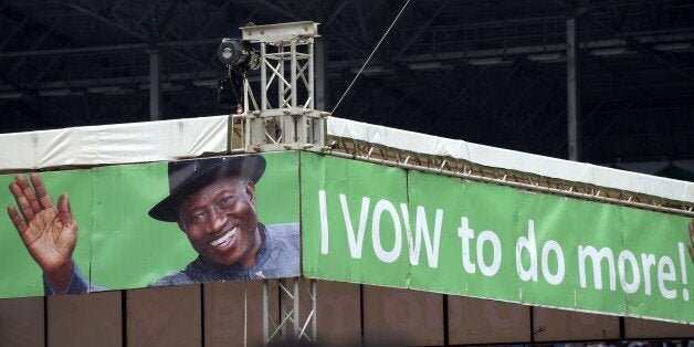 A campaign banner of Nigerian President and presidential candidate of the ruling People's Democratic Party (PDP) Goodluck Jonathan is displayed during a campaign event in Port Harcourt in the Niger Delta region on January 28, 2015. Nigeria's President Goodluck Jonathan on January 28 took his re-election campaign to the Niger Delta, knowing that victory in the key oil region will help determine the winner of next month's vote. The head of state, who is looking for a second four-year term, was in Port Harcourt, the capital of Rivers State, which is controlled by the opposition and seen as a pivotal election battleground. AFP PHOTO / PIUS UTOMI EKPEI (Photo credit should read PIUS UTOMI EKPEI/AFP/Getty Images)