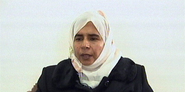 Iraqi Sajida Mubarek Atrous al-Rishawi confesses on Jordanian state run TV. Sunday Nov. 13, 2005 about her failed bid to set off an explosives belt inside one of the three Amman hotels targeted by al-Qaida. Fifty-seven people were killed on Wednesday's attack on three Amman hotels. (AP Photo/Jordanian TV) ** JORDAN OUT TV OUT **