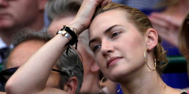 Actress Kate Winslett watch Andy Murray of Britain play Juan Carlos Ferrero of Spain in their quarterfinal singles match on centre court at Wimbledon, Wednesday, July 1, 2009. (AP Photo/Anja Niedringhaus)