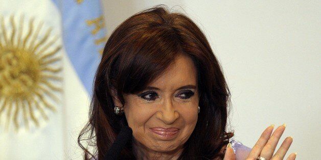 Argentine President Cristina Kirchner gestures during a ceremony with provincial governors, in Buenos Aires, on January 30, 2015. President Cristina Kirchner on Monday said that she will disband Argentina's intelligence service after a prosecutor was found dead just hours before he was to make explosive allegations against her. AFP PHOTO / ALEJANDRO PAGNI (Photo credit should read ALEJANDRO PAGNI/AFP/Getty Images)