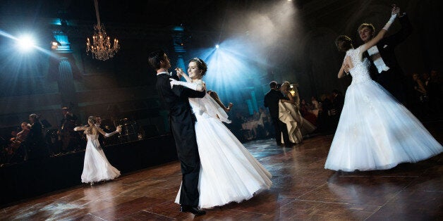 LONDON, ENGLAND - NOVEMBER 02: Young mainly Russian debutantes make their first performance before the assembled audience in Old Billingsgate Hall on November 2, 2014 in London, England. Debutantes attend the second ever London based Russian Ball at Old Billingsgate Hall. The ball marks the 'coming out' into society of 60 young women who are partnered for the evening by 60 young men. The successful debutantes were selected earlier this year from over 500 applicants and both the young men and women have to be single and aged between 16-25. Dance lessons are given ahead of the ball and during the evening the 1,000 guests also watch a performance by the Russian Virtuosi of Europe chamber orchestra. The Russian Ball attempts to recreate the lavish balls of years gone by and with a large Russian community London was deemed to be the perfect venue. (Photo by Matthew Lloyd/Getty Images)