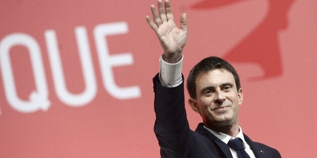 French Prime Minister Manuel Valls waves after delivering a speech during a French Socialist Party (Parti Socialist, PS) meet